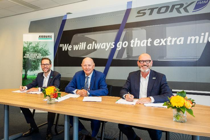 Steffen Kroner, Philip Stibbe and Guido Frohnhaus signing the purchase agreement for Stork IMM in Hengelo, the Netherlands