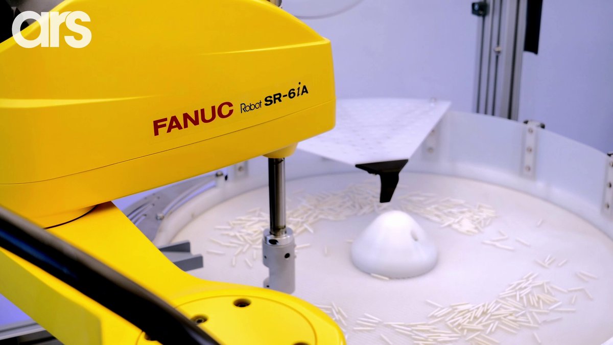 FlexiBowl feeding small pins to a FANUC robot